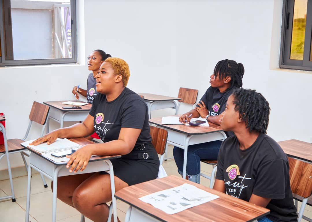 Students in a massage therapy practical session